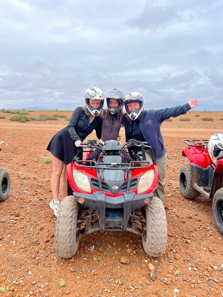 Group of friends on a quad bike